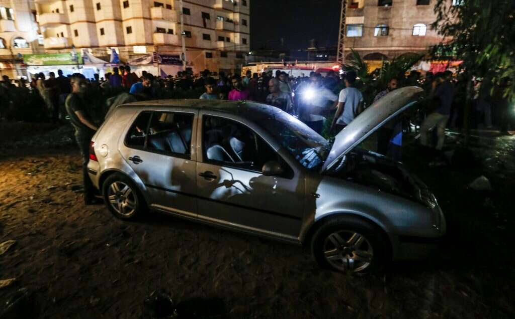 אחד מאתרי הפיצוצים ברצועת עזה, אמש. | AFP אחד מאתרי הפיצוצים ברצועת עזה, אמש. | AFP