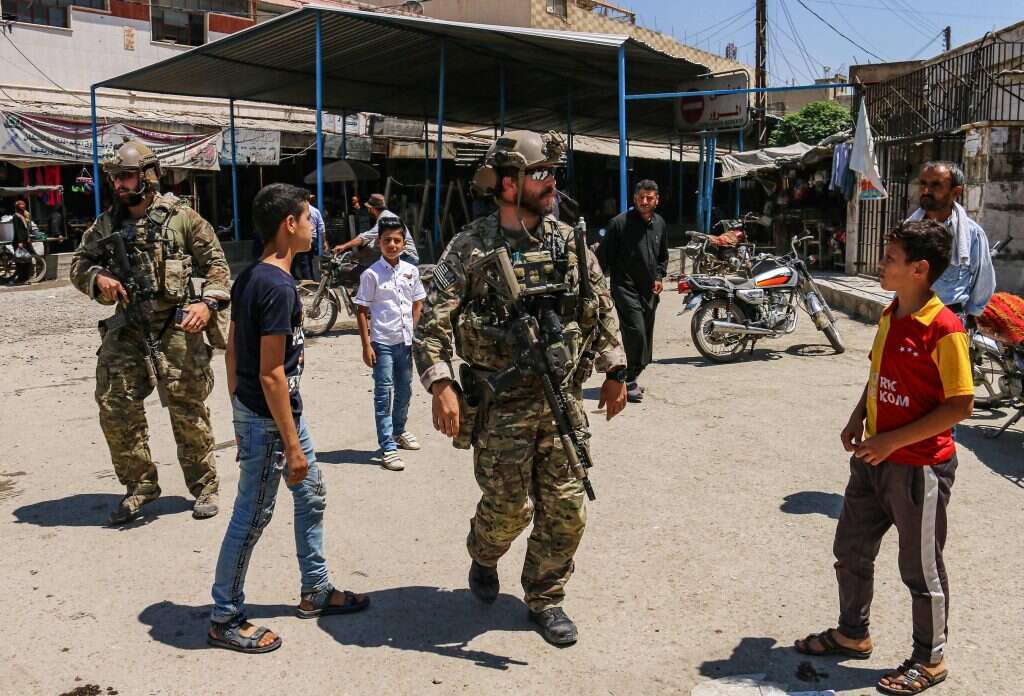 הנסיגה תזרז את הזרמת התחמושת מאיראן. חיילים אמריקנים בסוריה. | AFP