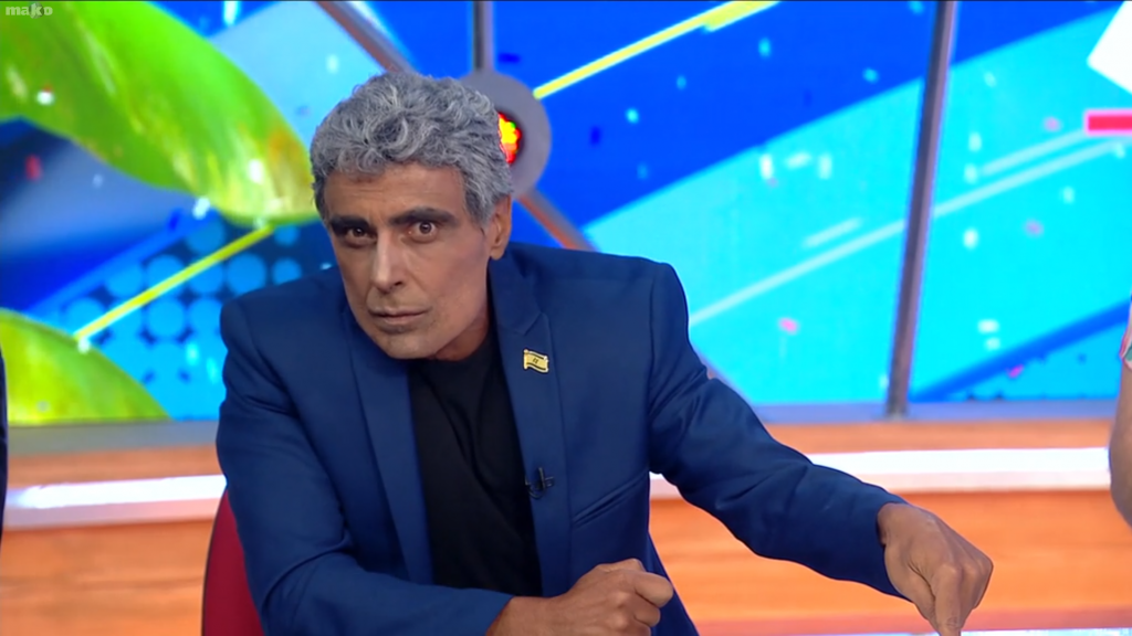 אלי פיניש כיאיר לפיד בארץ נהדרת. | מסך מתוך מאקו, ערוץ 12