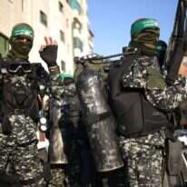 לוחמי הקומנדו הימי של חמאס. | ארכיון: AFP לוחמי הקומנדו הימי של חמאס. | ארכיון: AFP