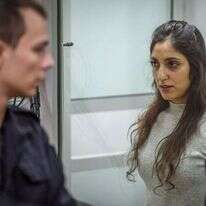 נעמה יששכר מובאת לדיון במוסקבה. | AFP