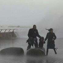 נמלטים מגלים בסערה, נמל תל אביב. | EPA