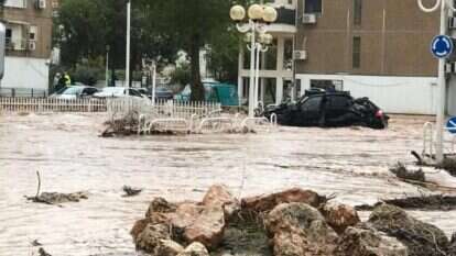 רכב שנסחף בשיטפון בנהריה, ארכיון. | נועם פלקאסא, TPS