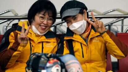 תיירם מדרום-קוריאה עוזבים את ישראל. | AFP תיירם מדרום-קוריאה עוזבים את ישראל. | AFP