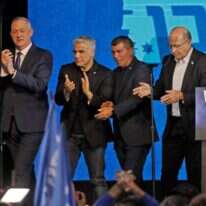 רביעיית כחול לבן בליל הבחירות. | AFP