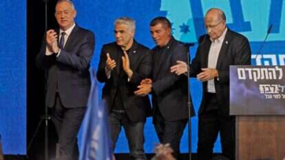 רביעיית כחול לבן בליל הבחירות. | AFP