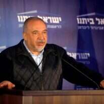 יו"ר ישראל ביתנו אביגדור ליברמן בליל הבחירות. | AFP