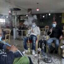 מתמודדים עם הקורונה בחברון. | AFP מתמודדים עם הקורונה בחברון. | AFP