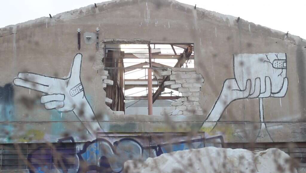 רגעיו האחרונים של מתחם בלב העיר. | מתוך הסרט מתחם חסן ערפה