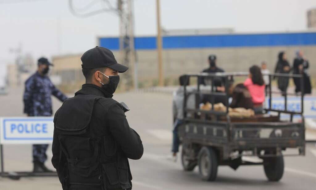 כוחות ביטחון של חמאס במחסום בעזה. | AFP כוחות ביטחון של חמאס במחסום בעזה. | AFP