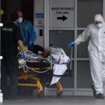 פינוי חולה קורונה בליברפול. | AFP