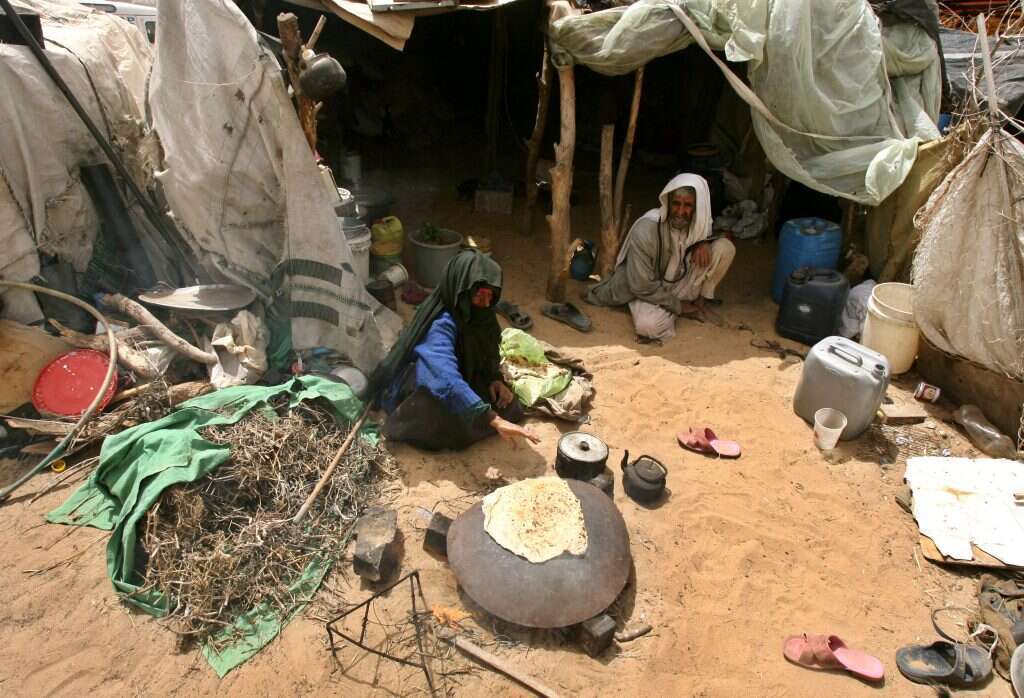 אפייה מסורתית בכפר בדואי. למצולמים אין קשר לנאמר. | AFP אפייה מסורתית בכפר בדואי. למצולמים אין קשר לנאמר. | AFP