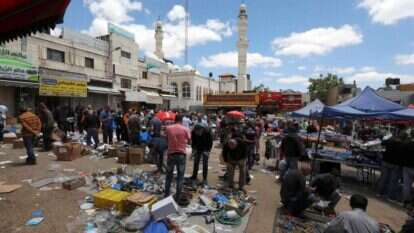 שוק ברמאללה בעקבות ההקלות בהנחיות. | AFP