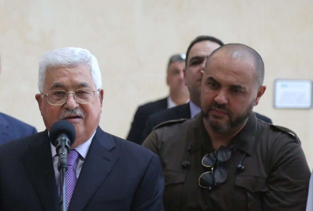 טארק עבאס ואביו אבו מאזן. | AFP