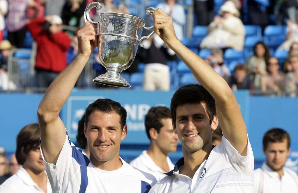 ג'וקוביץ' וארליך בטורניר קווינס ב– 2010. | EPA