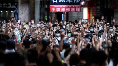 הפגנה נגד החוק החדש בהונג-קונג, ביום רביעי. | AFP הפגנה נגד החוק החדש בהונג-קונג, ביום רביעי. | AFP