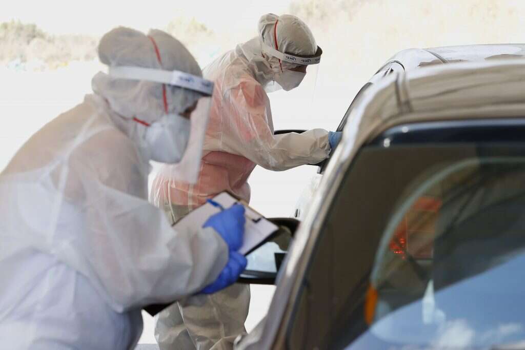 בדיקות קורונה במתחם דרייב אין. | AFP