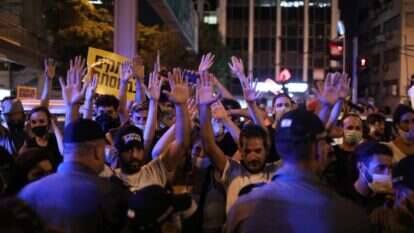 ההפגנה בכיכר רבין במוצאי שבת. | EPA ההפגנה בכיכר רבין במוצאי שבת. | EPA