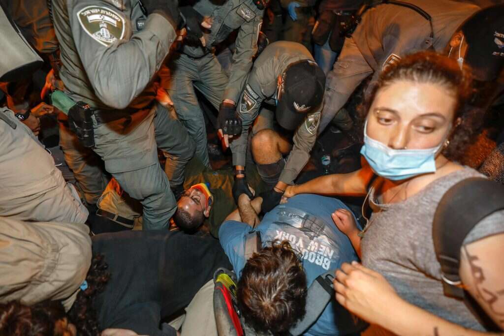 הפגנה מול בלפור במוצאי שבת. | AFP