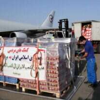 מטוס אספקה איראני בשדה התעופה בטהרן. | AFP