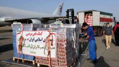 מטוס אספקה איראני בשדה התעופה בטהרן. | AFP