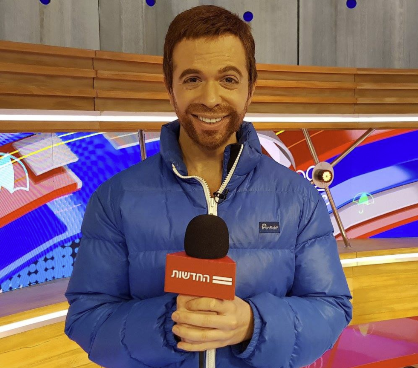 הדמות שלו ב"ארץ נהדרת" בגילומו של רועי בר–נתן. | מסך הדמות שלו ב"ארץ נהדרת" בגילומו של רועי בר–נתן. | מסך