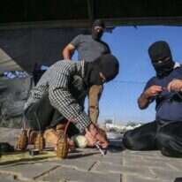 הכנת בלוני טרור בעזה. | AFP