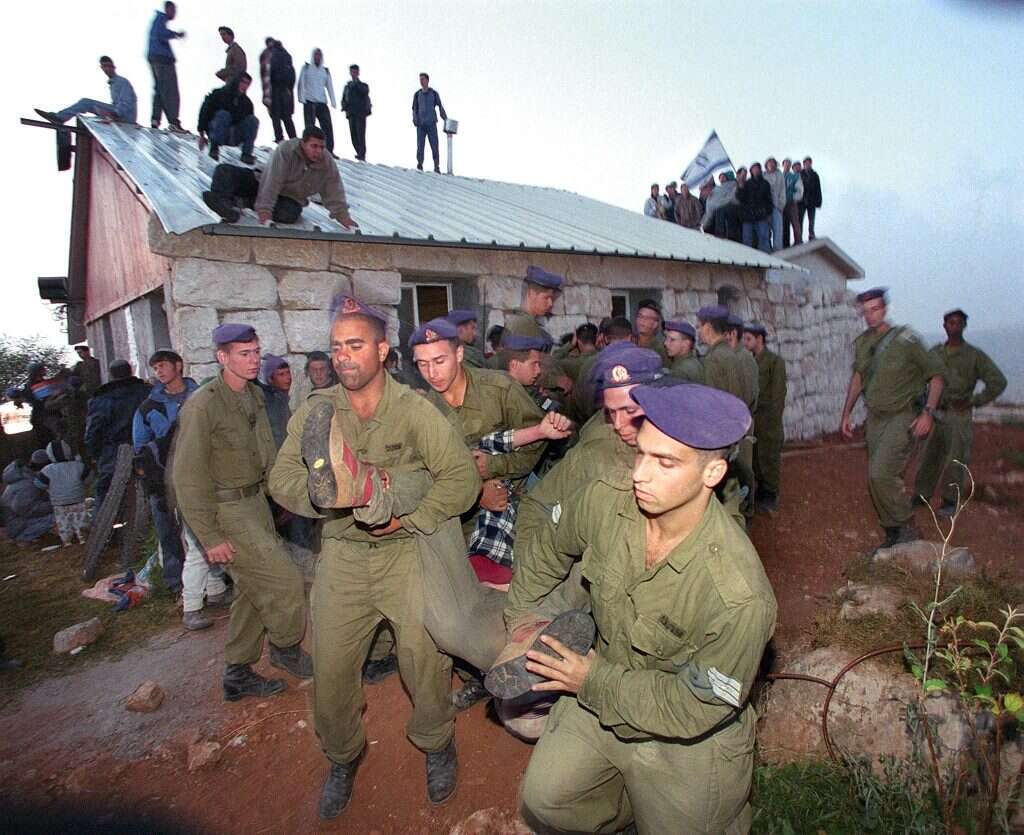 לא הצלחתי לעשות כלום". פינוי חוות מעון. | AFP