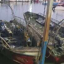 הסירות שהוצתו . | יאיר קראוס