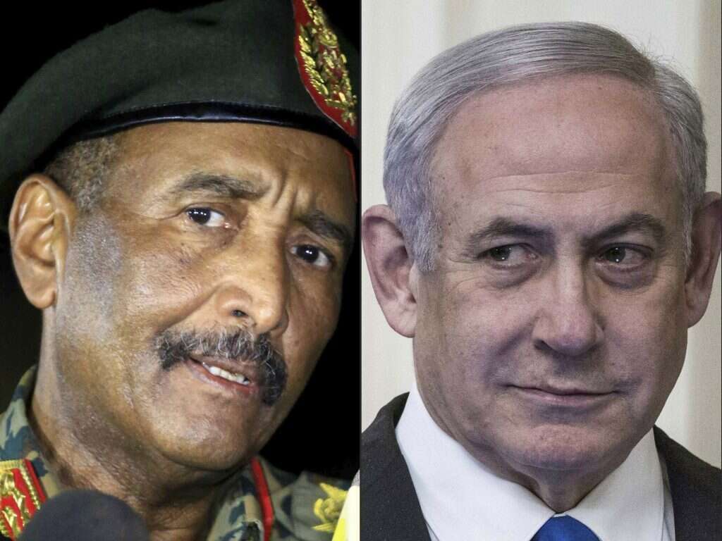 נתניהו ויו"ר מועצת הריבונות של סודן עבד אל פתאח אל-בורהאן. צילומים: AFP