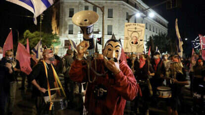 מפגינים בבלפור. | EPA