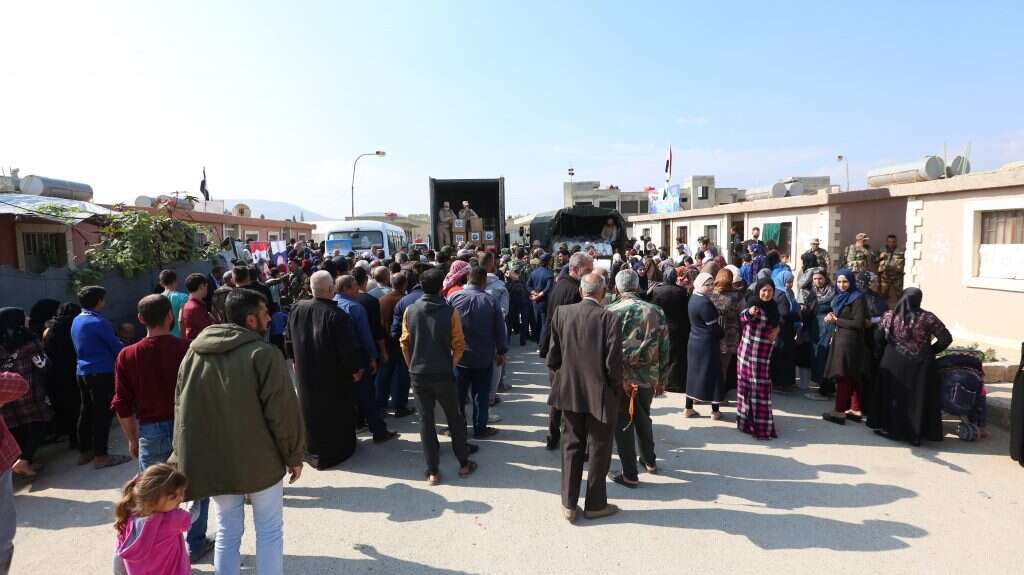 חלוקת סיוע הומניטרי בדמשק, בשבוע שעבר. | אי-פי-אי
