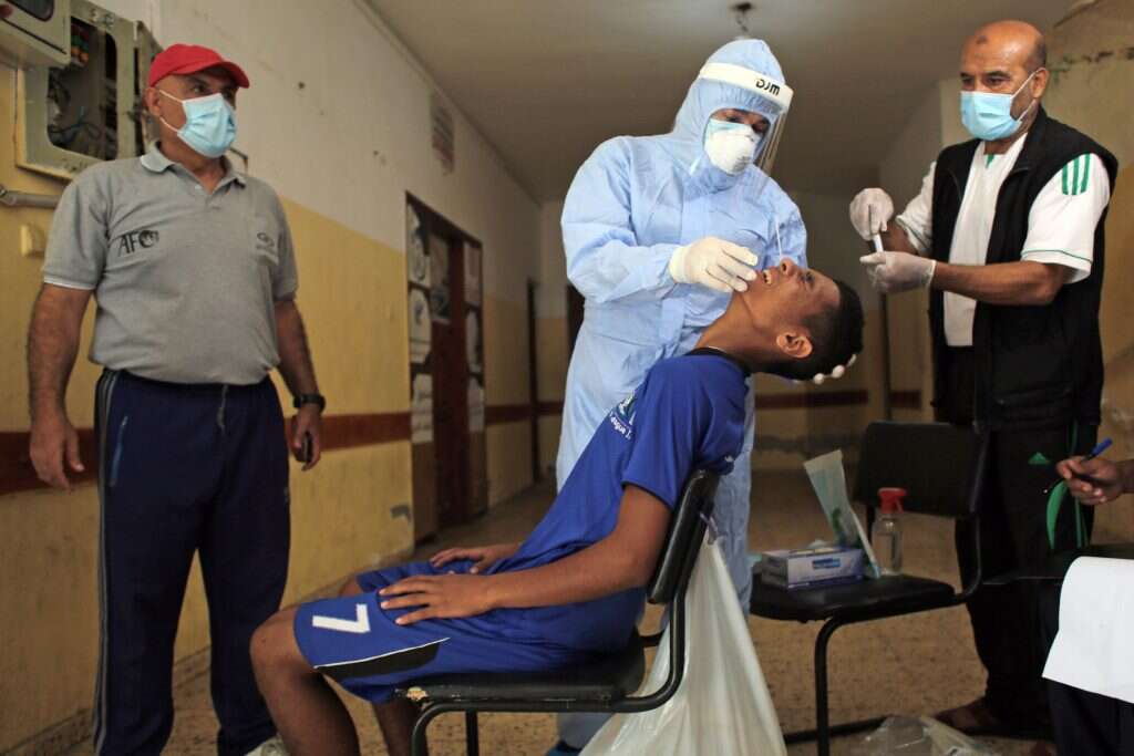 בדיקת קורונה בעזה. | AFP בדיקת קורונה בעזה. | AFP