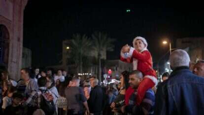 המחבר חי כבן המיעוט הנוצרי בתוך המיעוט הערבי במדינת ישראל היהודית. חג המולד ביפו, 2017. | מרים אלסטר, פלאש 90