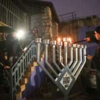 הדלקת נרות חנוכה של חב"ד. צפת 2018. | דוד כהן, פלאש 90