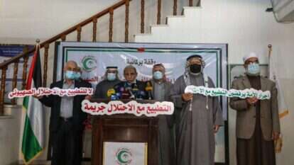 בכיר חמאס מחמוד א-זהאר נואם באירוע מחאה בעזה נגד ההסכם בין מרוקו לישראל. | גטי אימג'ס