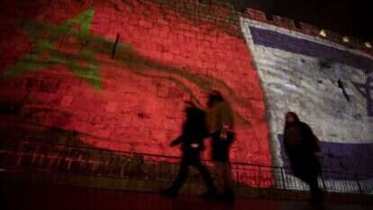 דגלי ישראל ומרוקו על חומות העיר העתיקה. | EPA דגלי ישראל ומרוקו על חומות העיר העתיקה. | EPA