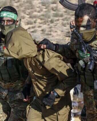 מחבלי חמאס וגא"פ מתרגלים חטיפת חייל | AFP מחבלי חמאס וגא"פ מתרגלים חטיפת חייל | AFP