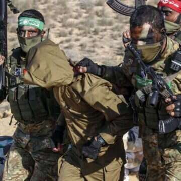 מחבלי חמאס וגא"פ מתרגלים חטיפת חייל | AFP מחבלי חמאס וגא"פ מתרגלים חטיפת חייל | AFP