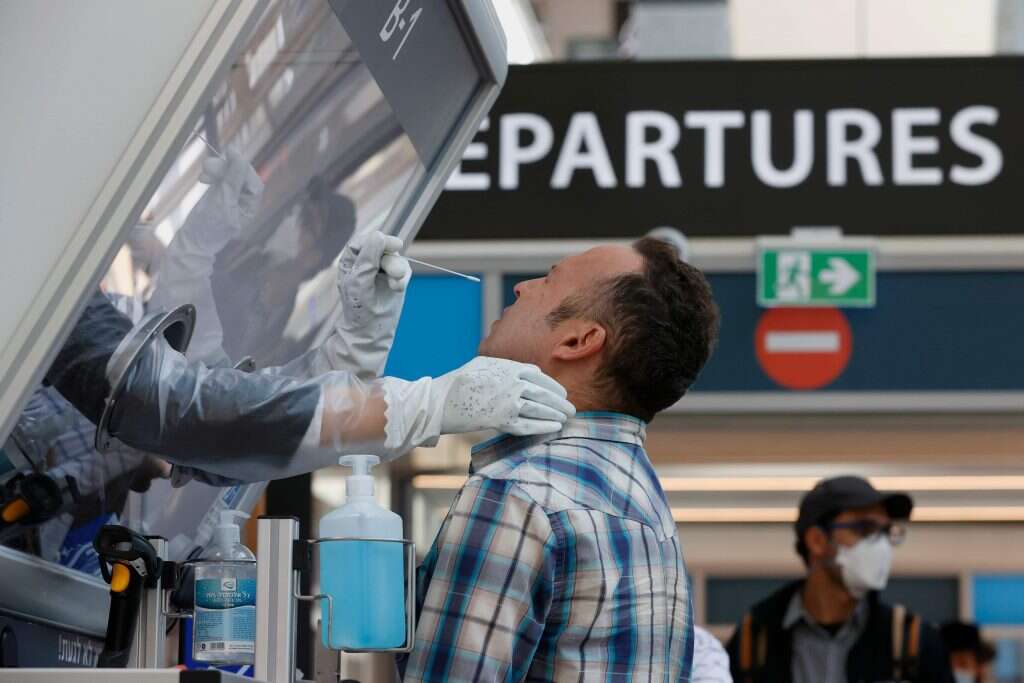 עמדות בדיקת הקורונה בנתב"ג. נובמבר 2020. | AFP עמדות בדיקת הקורונה בנתב"ג. נובמבר 2020. | AFP