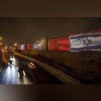 חומות העיר העתיקה בירושלים מוארות בדגלי ישראל ומרוקו כמסר של שלום, ירושלים, דצמבר 2020. | EPA