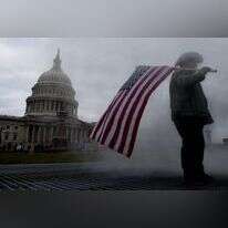 תומך טראמפ בעצרת מחוץ לקפיטול. | AFP