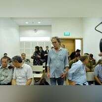 מוחמד בכרי (במרכז) בבית המשפט המחוזי בלוד, 2018. | יוסי זליגר