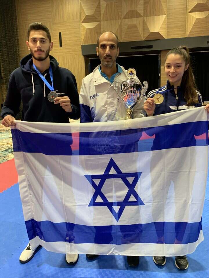 סומברג עם יחיעם המאמן ובן הזוג נמרוד. | באדיבות המרואיינת