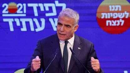 יו"ר יש עתיד יאיר לפיד במטה המפלגה בליל הבחירות. | AFP יו"ר יש עתיד יאיר לפיד במטה המפלגה בליל הבחירות. | AFP