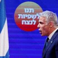 יאיר לפיד, מוצאי בחירות 2021. | AFP יאיר לפיד, מוצאי בחירות 2021. | AFP