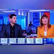 מוחמד מג'אדלה עם רינה מצליח בפאנל. | מסך מתוך חדשות 12