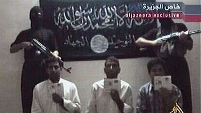 אנשי דאעש ובני ערובה, 2004. | AP