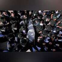 לוויה של אחד הנספים באסון במירון. | AFP