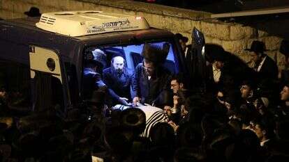 לוויה של אחד הנספים באסון במירון. | EPA